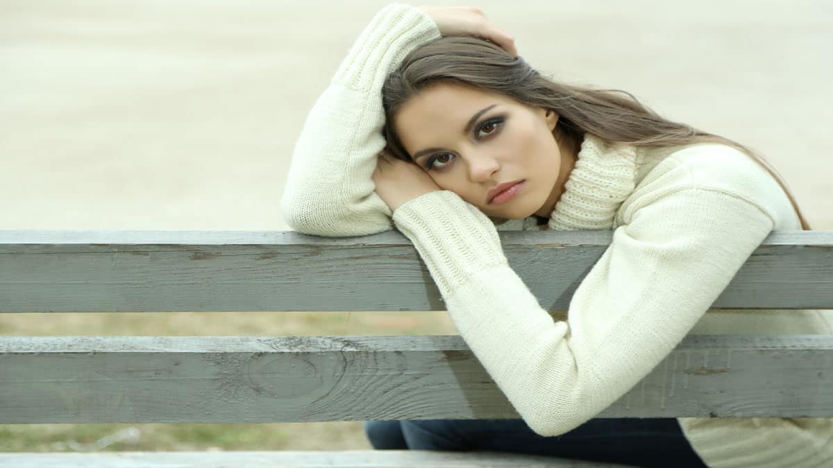 lonely woman on bench