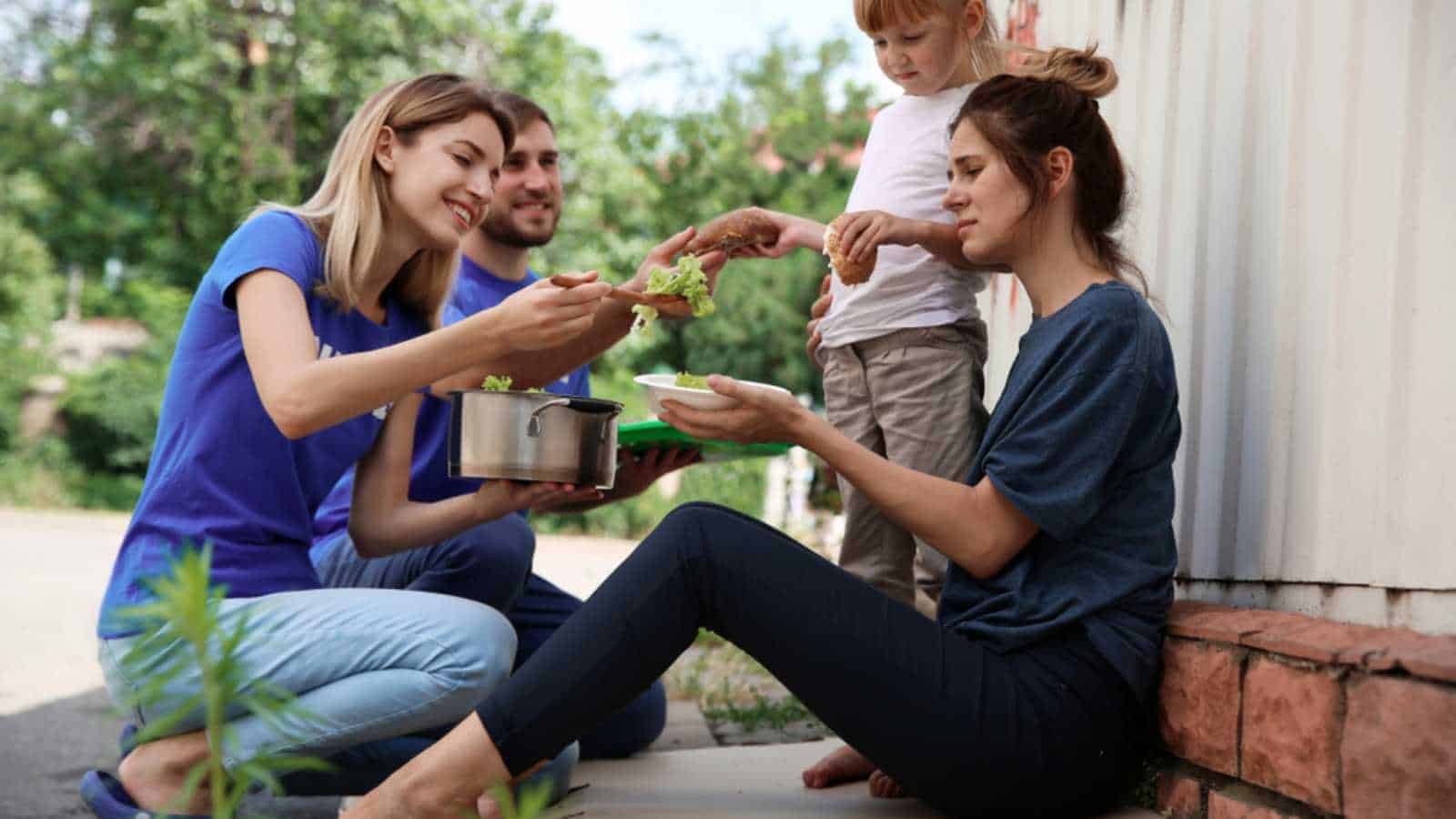 Offering-food-to-homeless-people - Unfinished Success