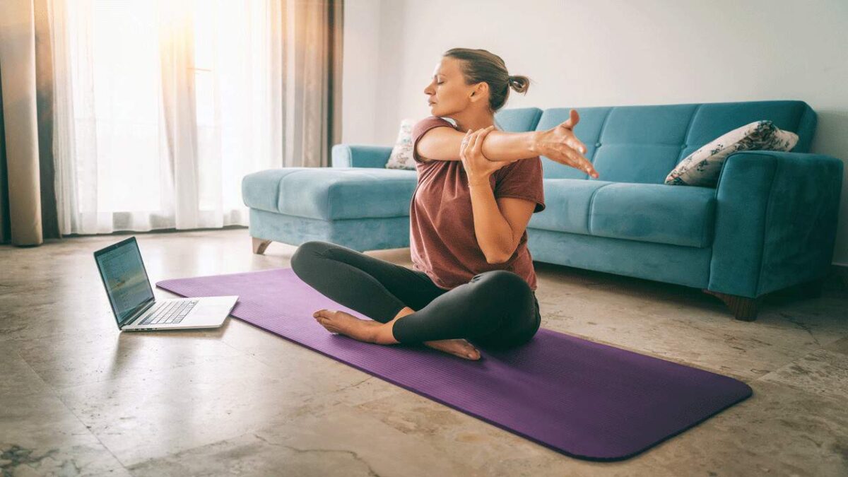 woman stretching yoga